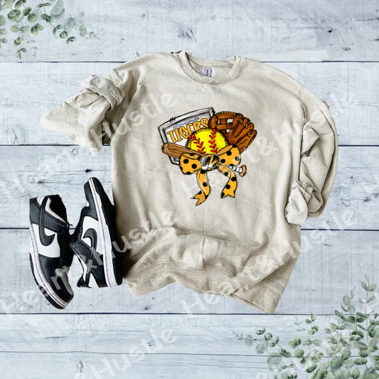 Alamogordo Softball bow and glove