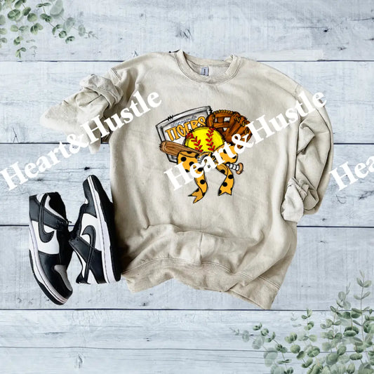 Alamogordo Softball bow and glove